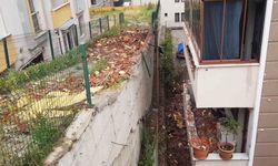Çatı katının yıkılan duvarı 3 daireye zarar verdi