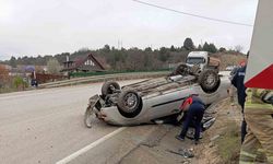 Takla atan otomobilden yara almadan kurtuldu